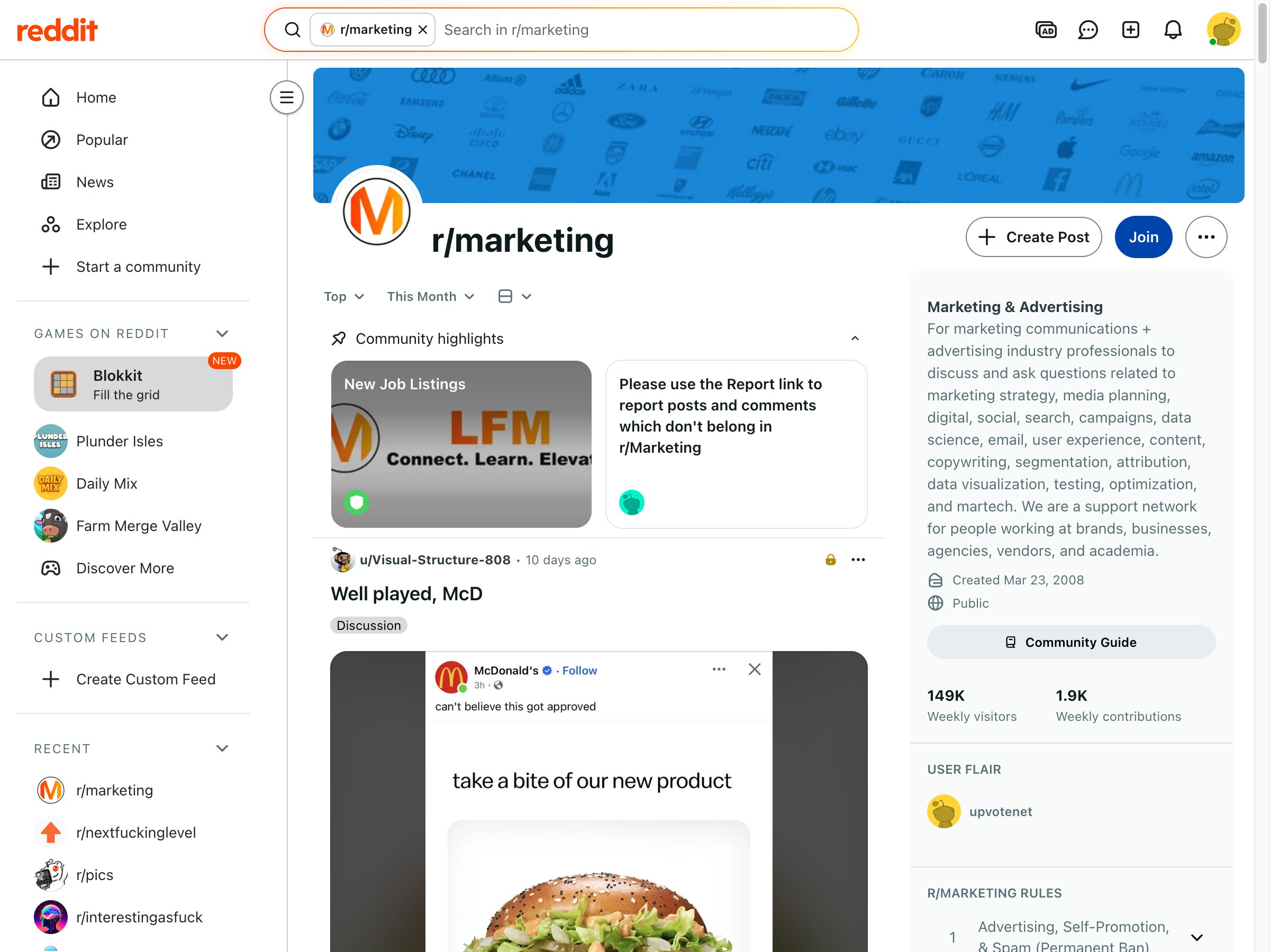 The r/marketing subreddit on Reddit showing active discussions and community engagement between marketers